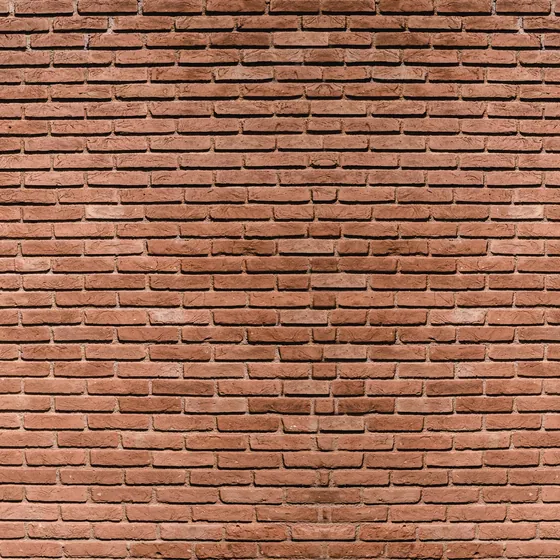 Texture d’habillage effet mur de briques rouges anciennes